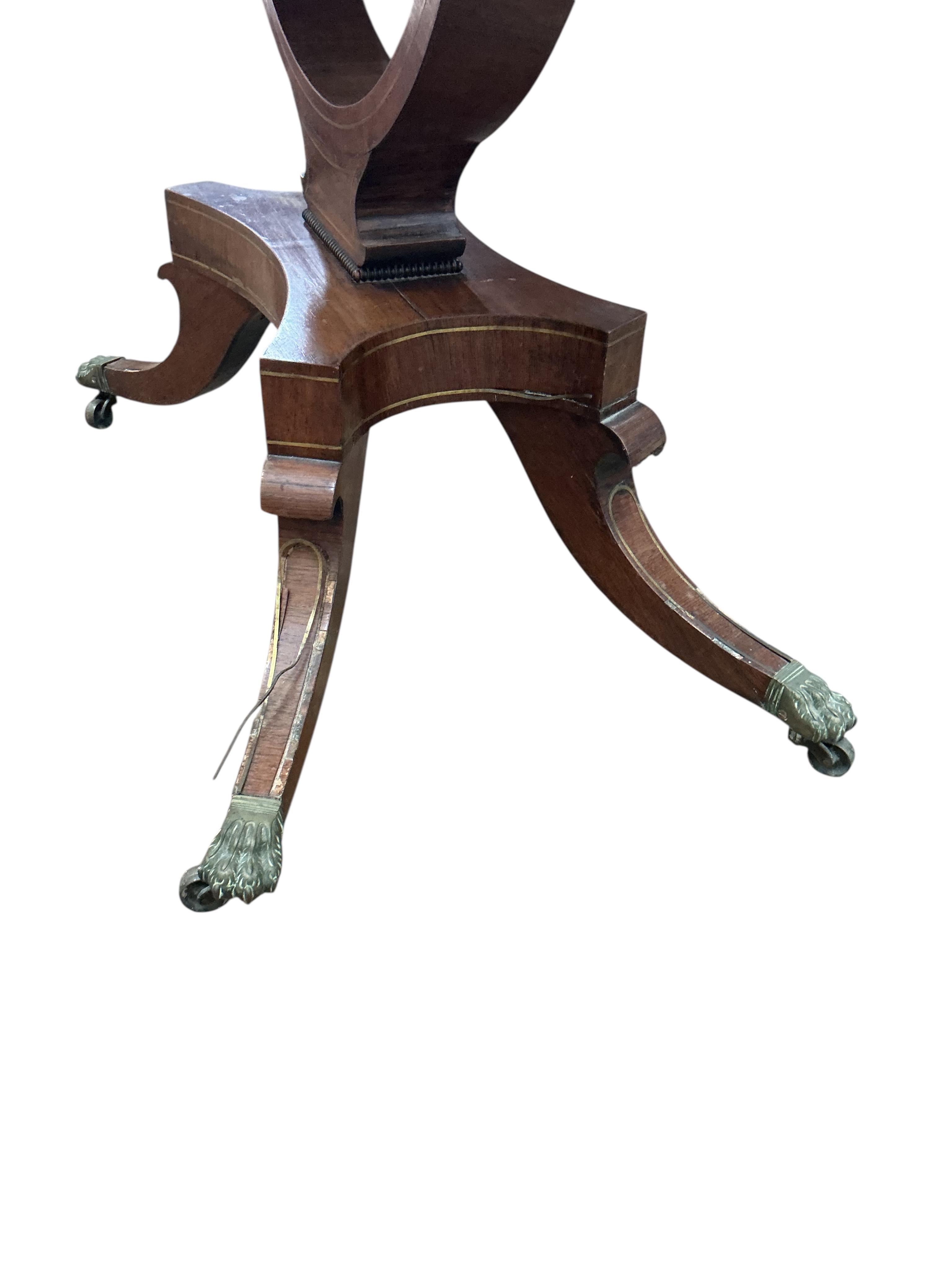 A Regency brass mounted rosewood folding card table, width 89cm, depth 44cm, height 74cm